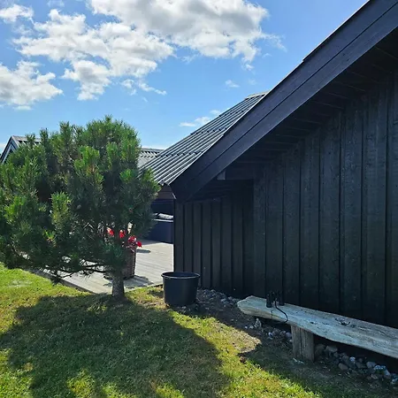 House In Nature By The Water At Lango